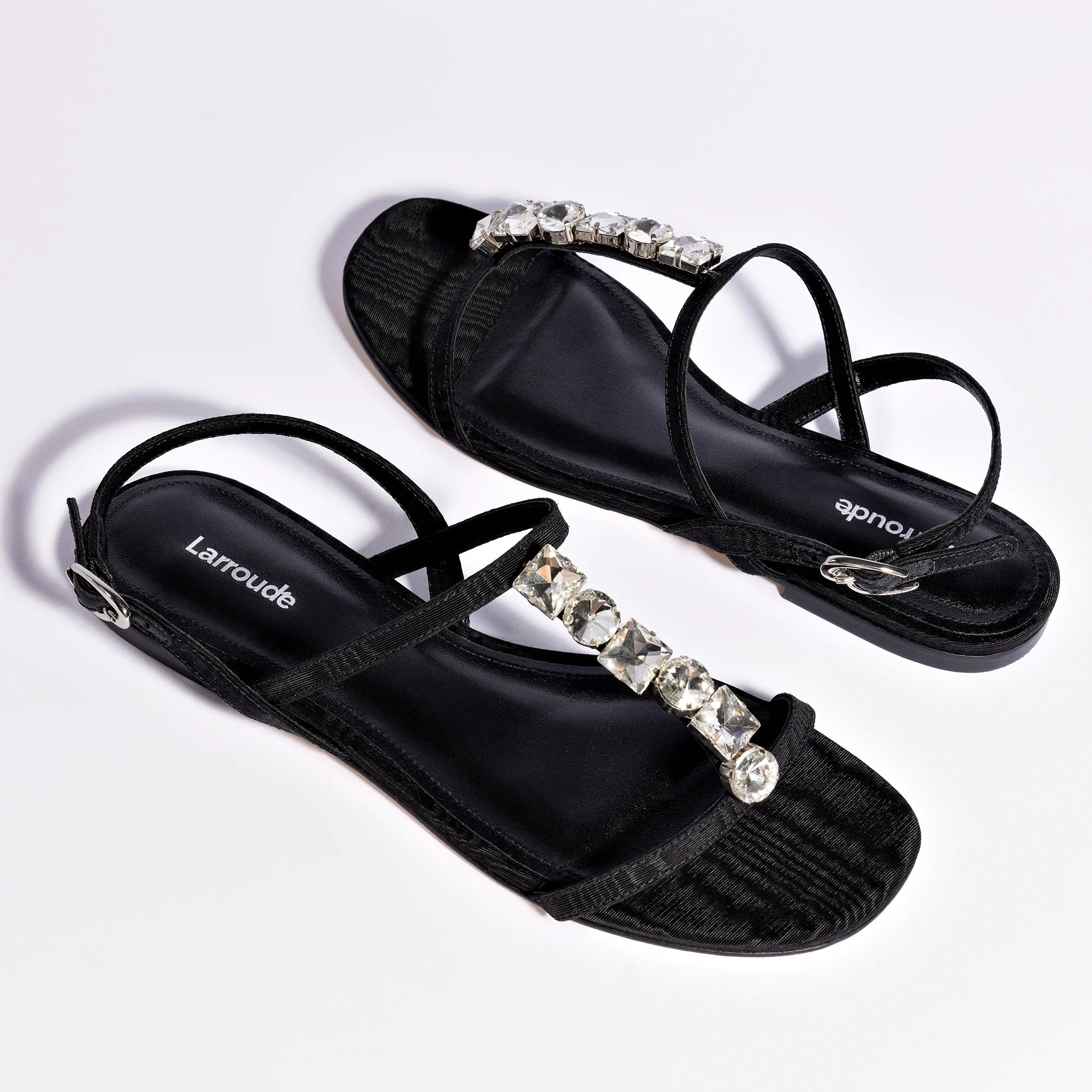 LARROUDE Calypso Flat Sandal In Black Fabric and Crystals